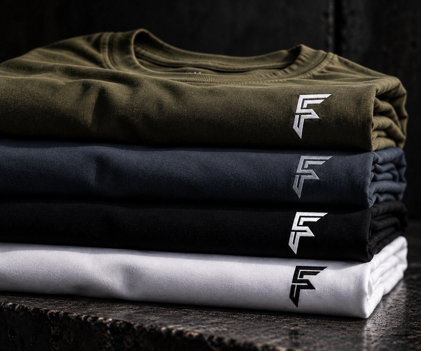 Frontline Athletics tees in olive, navy, black and white